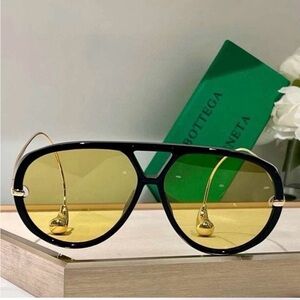 Bottega Veneta Black Frame Sunglasses with Gold Accents